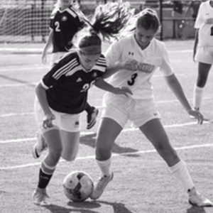 girls playing soccer