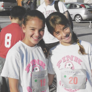 two girls smiling
