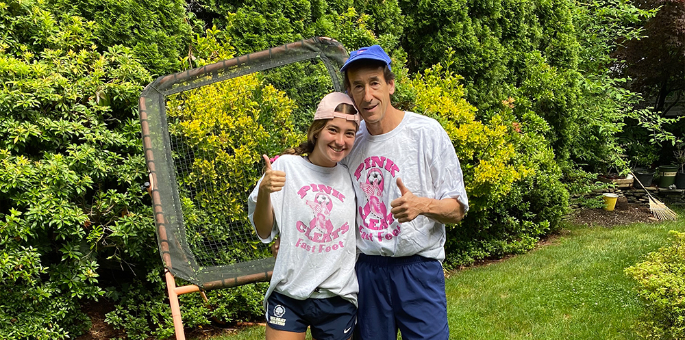 father-daughter-hugging-sports